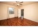 Cozy bedroom features a ceiling fan, window, and access to the outdoor patio area at 8777 W Maule Ave # 1087, Las Vegas, NV 89148