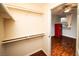 Walk-in closet with built-in shelving adjacent to bedroom at 8777 W Maule Ave # 1087, Las Vegas, NV 89148