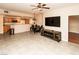 Spacious living area with a dining table, TV console, and open-concept layout at 8777 W Maule Ave # 1087, Las Vegas, NV 89148