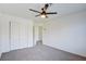 Neutral bedroom featuring carpet, ceiling fan, and a closet at 8787 Tom Noon Ave # 101, Las Vegas, NV 89178
