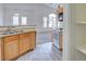 Kitchen area offers a view into the bright and airy living space with neutral color palette at 8787 Tom Noon Ave # 101, Las Vegas, NV 89178