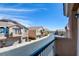 Charming neighborhood street view showcases well-maintained homes under a bright blue sky at 8787 Tom Noon Ave # 101, Las Vegas, NV 89178