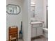 Bathroom featuring a mirror, vanity, and adjacent toilet and shower at 9000 Sundial Dr, Las Vegas, NV 89134