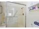 Clean, modern shower stall features grab bars and built-in shelving for convenience at 9000 Sundial Dr, Las Vegas, NV 89134