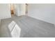 Bedroom showing plush carpeting, ceiling fan and entrances to a bathroom and closet at 9267 Lapeer St, Las Vegas, NV 89178