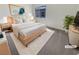 Cozy main bedroom with a queen-size bed and neutral decor at 9267 Lapeer St, Las Vegas, NV 89178