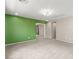 Spacious bonus room with plush carpeting and neutral color palette at 9277 Ardoa Ave, Las Vegas, NV 89148