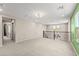 Open bonus room with staircase access, offering flexible living space at 9277 Ardoa Ave, Las Vegas, NV 89148