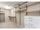 Organized walk-in closet featuring shelving and drawer storage at 9277 Ardoa Ave, Las Vegas, NV 89148