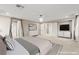 Spacious main bedroom with plush carpet and access to ensuite bath at 9277 Ardoa Ave, Las Vegas, NV 89148
