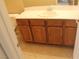 Bathroom featuring wooden cabinetry and a tile floor at 932 Tafalla Ct, Las Vegas, NV 89138