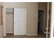 Bedroom features carpeted floor and a closet door at 932 Tafalla Ct, Las Vegas, NV 89138