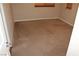 A clean, empty bedroom with neutral carpet and blinds at 932 Tafalla Ct, Las Vegas, NV 89138