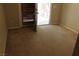 Bedroom featuring carpeted floors and a window at 932 Tafalla Ct, Las Vegas, NV 89138