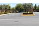 View of paved community entrance with stone landscape at 932 Tafalla Ct, Las Vegas, NV 89138