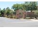 Community entrance with desert landscaping and community name marker at 932 Tafalla Ct, Las Vegas, NV 89138