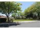 Neighborhood park offering lush green spaces and park benches at 932 Tafalla Ct, Las Vegas, NV 89138
