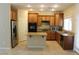 Kitchen featuring stainless steel appliances and wooden cabinetry at 932 Tafalla Ct, Las Vegas, NV 89138