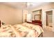 Cozy bedroom featuring a full bath and spacious walk-in closet perfect for an organized retreat at 9343 Clear Day Ln, Las Vegas, NV 89178