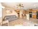 Spacious living area features tile floors, neutral colors, and seamlessly connects to the kitchen at 9343 Clear Day Ln, Las Vegas, NV 89178