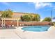 Community pool area with lounge chairs, shade structure, and well-maintained landscaping at 9343 Clear Day Ln, Las Vegas, NV 89178