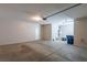 Spacious two car garage with concrete flooring at 9428 Noble Fir Ridge Ave, Las Vegas, NV 89143