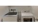 New laundry room features a modern washer and dryer set at 9428 Noble Fir Ridge Ave, Las Vegas, NV 89143