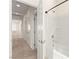 Bathroom with a shower over tub and hallway access at 9519 Wild Valley Ave, Las Vegas, NV 89148