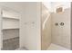 Bathroom with a large, tiled walk-in shower with built in shelving at 9519 Wild Valley Ave, Las Vegas, NV 89148