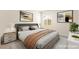 Cozy bedroom featuring neutral tones, comfortable bedding, and stylish decor for a serene retreat at 9519 Wild Valley Ave, Las Vegas, NV 89148