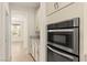 Stainless steel appliances and granite countertops appoint this modern kitchen at 9519 Wild Valley Ave, Las Vegas, NV 89148