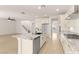 Modern kitchen featuring a central island, stainless appliances, granite countertops and an open floorplan at 9519 Wild Valley Ave, Las Vegas, NV 89148
