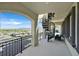 Elegant balcony with spiral staircase, comfortable seating, and a scenic vista at 10 Olympia Outlook Dr, Las Vegas, NV 89141