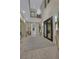 Elegant foyer with tall ceilings, a decorative chandelier, and a clear view to another room at 10 Olympia Outlook Dr, Las Vegas, NV 89141