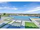 Gorgeous infinity pool with lush landscaping, providing a serene retreat and panoramic views of the surrounding landscape at 10 Olympia Outlook Dr, Las Vegas, NV 89141