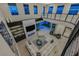 Open concept living room featuring soaring ceilings, large windows, and stylish decor at 10 Olympia Outlook Dr, Las Vegas, NV 89141