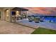 Outdoor patio with grill, dining, seating, and city views at 10 Olympia Outlook Dr, Las Vegas, NV 89141