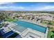 Stunning backyard oasis with a large pool and outdoor seating area, perfect for entertaining and relaxation at 10 Olympia Outlook Dr, Las Vegas, NV 89141