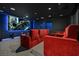 Home theater with reclining seats and a large screen at 10 Olympia Outlook Dr, Las Vegas, NV 89141