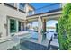 Beautiful outdoor water feature with seamless access to an outdoor kitchen and patio area at 10 Olympia Outlook Dr, Las Vegas, NV 89141