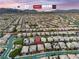 Picturesque aerial view showcasing a vibrant residential community near scenic mountain views and well-maintained streets at 10305 Turia Gardens Rd, Las Vegas, NV 89135