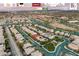 Expansive aerial view of a well-planned residential community with lush landscaping and convenient access to nearby amenities at 10305 Turia Gardens Rd, Las Vegas, NV 89135