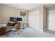 Office bedroom with a large window and a sleek, ergonomic desk at 10305 Turia Gardens Rd, Las Vegas, NV 89135