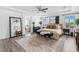 Elegant main bedroom featuring an ensuite bathroom, tray ceilings, and abundant natural light at 10305 Turia Gardens Rd, Las Vegas, NV 89135