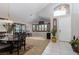 Elegant entryway with high ceilings, tile flooring, and a formal dining area with stylish decor at 10325 Falls Church Ave, Las Vegas, NV 89144