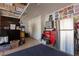Clean garage space has organizers, cabinetry, shelving and plenty of storage at 10325 Falls Church Ave, Las Vegas, NV 89144