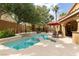 Backyard with swimming pool, hot tub, patio and lounge area, great for entertaining at 10325 Falls Church Ave, Las Vegas, NV 89144