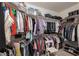 Spacious walk-in closet with ample shelving, hanging rods and organization options at 10325 Falls Church Ave, Las Vegas, NV 89144