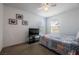 Bedroom with natural light, ceiling fan, and a flatscreen television at 1035 Spotted Saddle St, Henderson, NV 89015