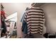 Walk-in closet with personal items at 1035 Spotted Saddle St, Henderson, NV 89015
